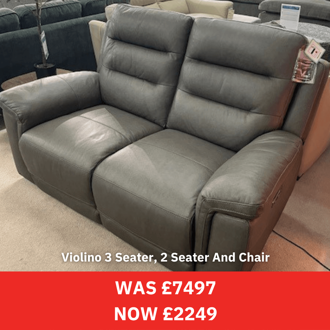 Gray Violino sofa set with price tag in a showroom setting