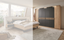 Modern wooden bedroom furniture set by Disselkamp, featuring a sleek bed frame and matching wardrobe