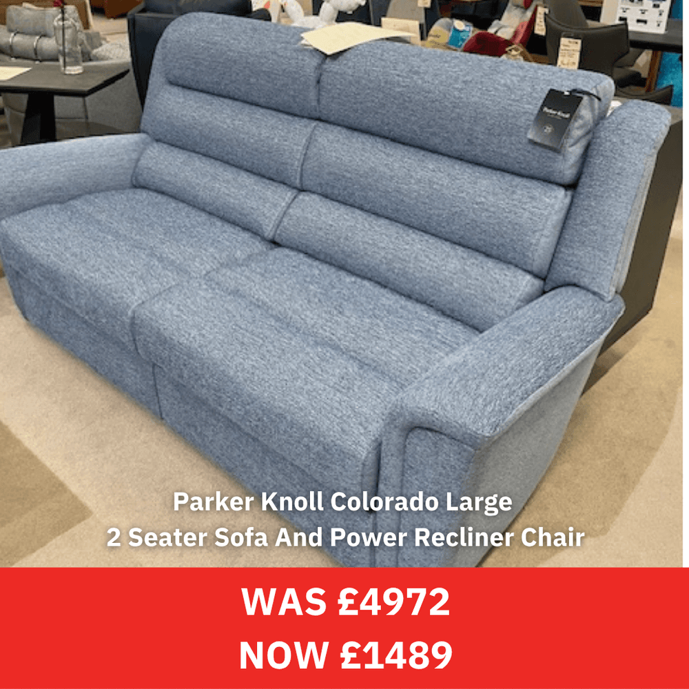 Blue Parker Knoll sofa with power recliner chair in a store setting, promotional text displayed.