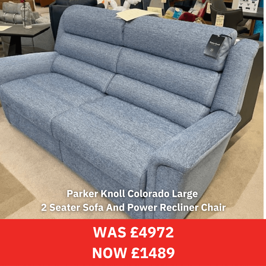 Blue Parker Knoll sofa with power recliner chair in a store setting, promotional text displayed.